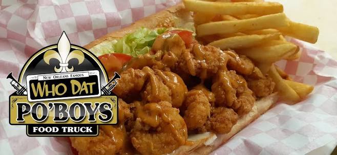 Who Dat fried shrimp po'boy dressed with lettuce and tomato and served with fries